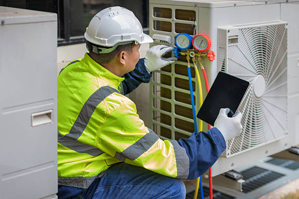 Professional Hvac technician working in College Corner, OH